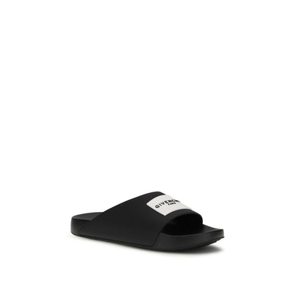 Givenchy Black Rubber Slippers 1728,72470364320,Black,EU39/US6,EU40/US7,EU41/US8,EU42/US9,EU43/US10,EU44/US11,EU45/US12,EU46/US13,Givenchy,Men,New with tags,Sandals - Shoes,Shoes,Slippers - Sandals - Shoes