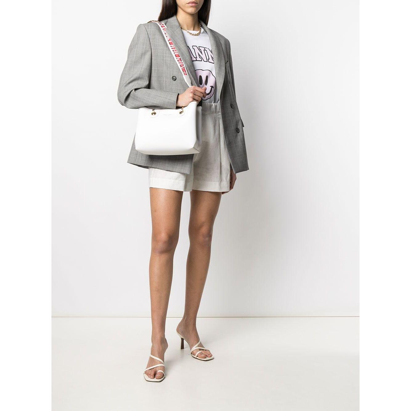 Front view with bag zipped and handles upright.