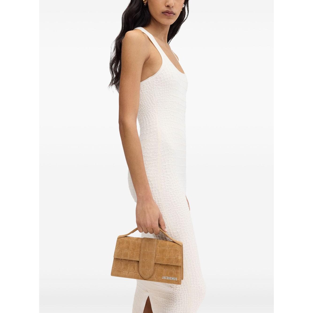 Front view with bag zipped and handles upright.