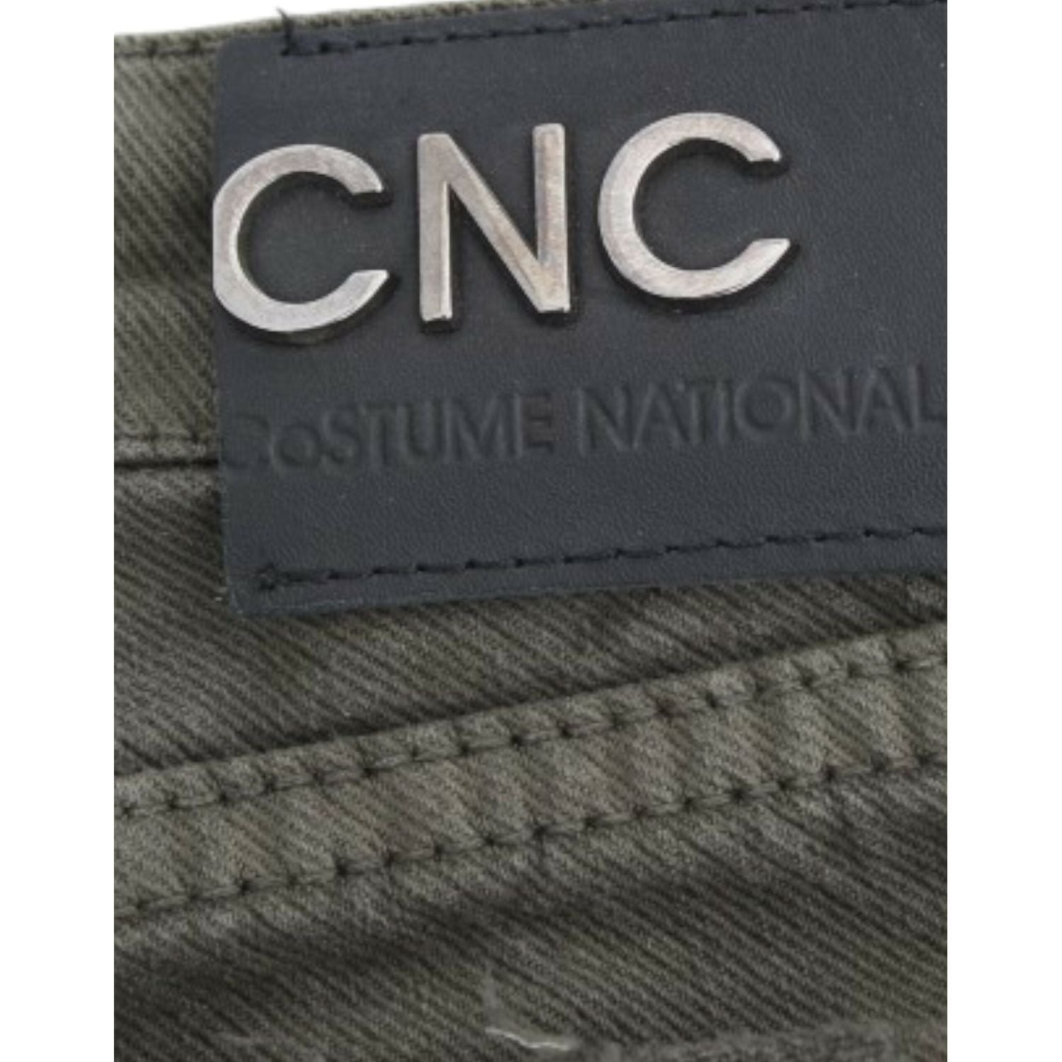 别致的绿色修身牛仔裤