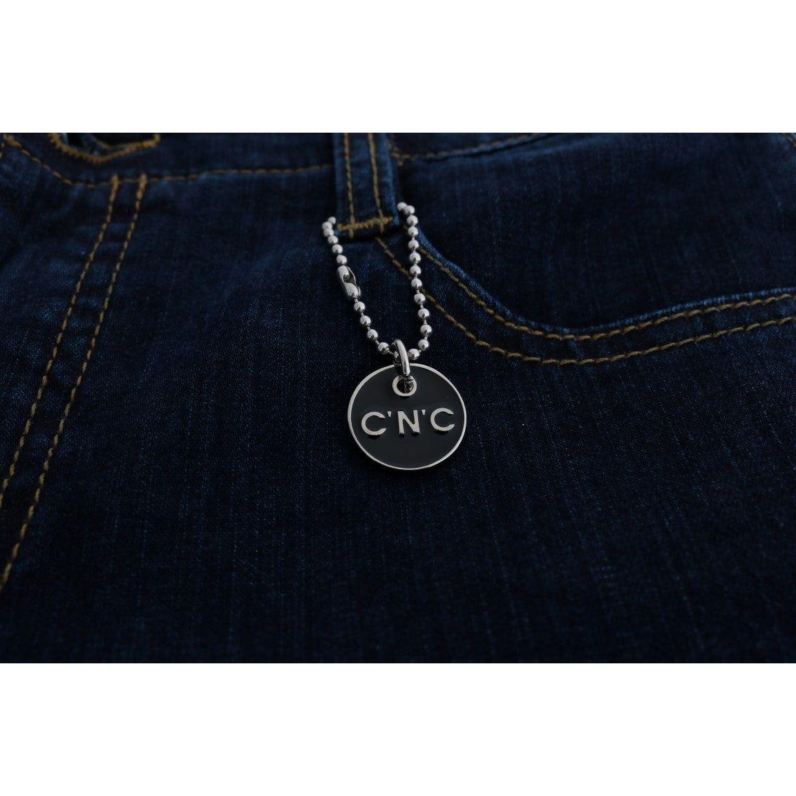 بنطلون جينز من القطن بتصميم أنيق وواسع باللون الأزرق من كوستيوم ناشيونال شيك