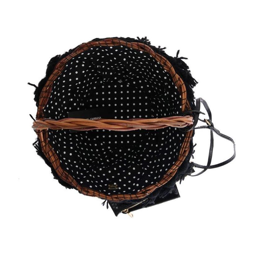 别致的米色和黑色草编蛇皮水桶包