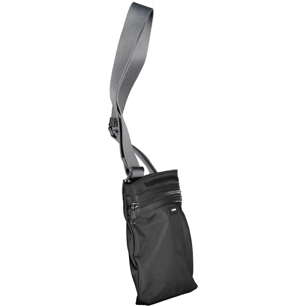 Front view with bag zipped and handles upright.