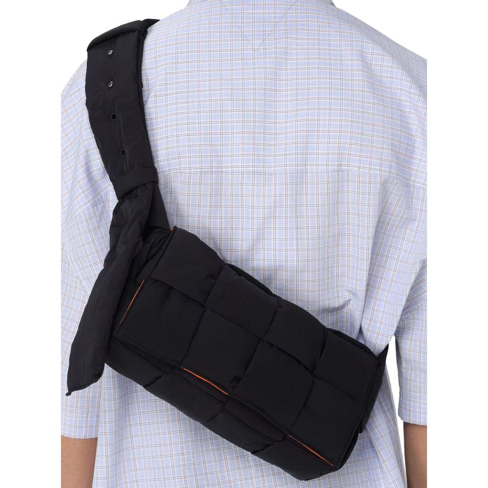 Front view with bag zipped and handles upright.